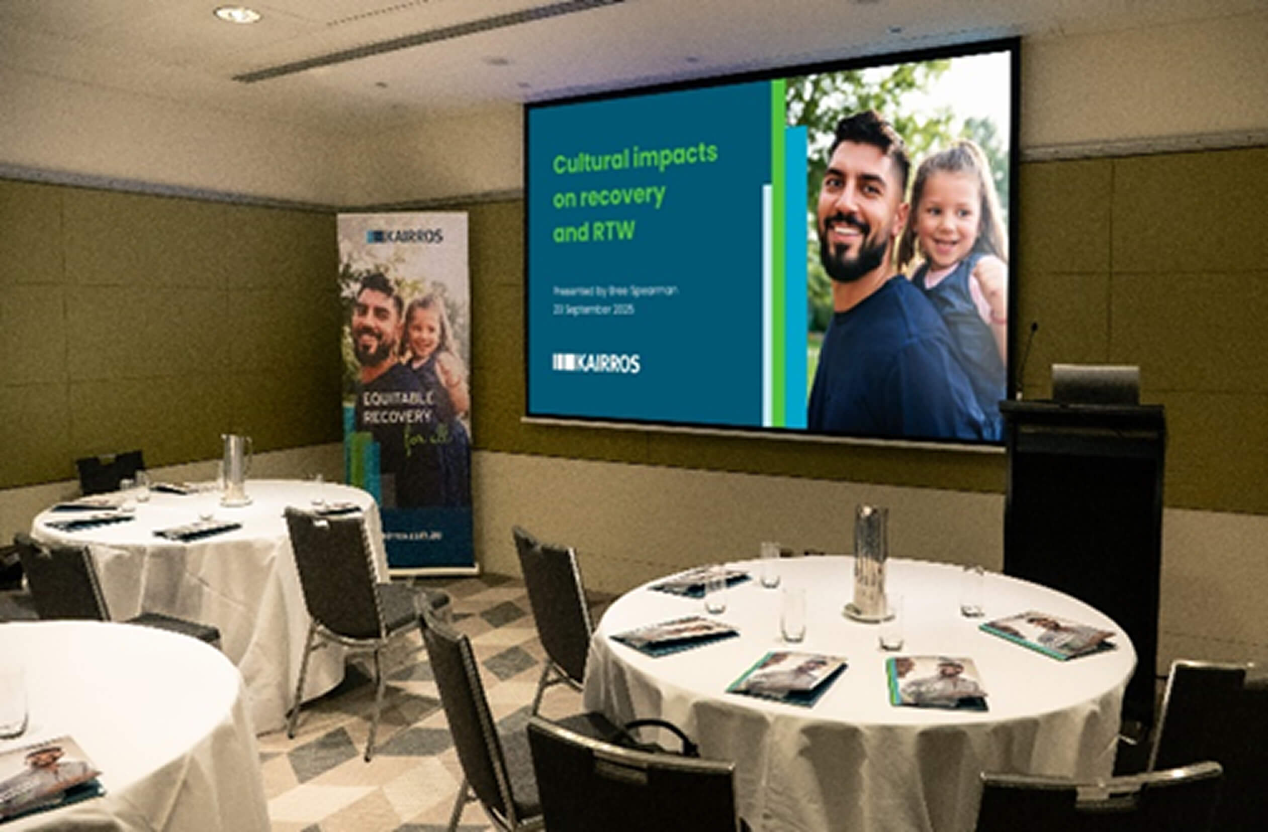 A projector in a room with conference tables